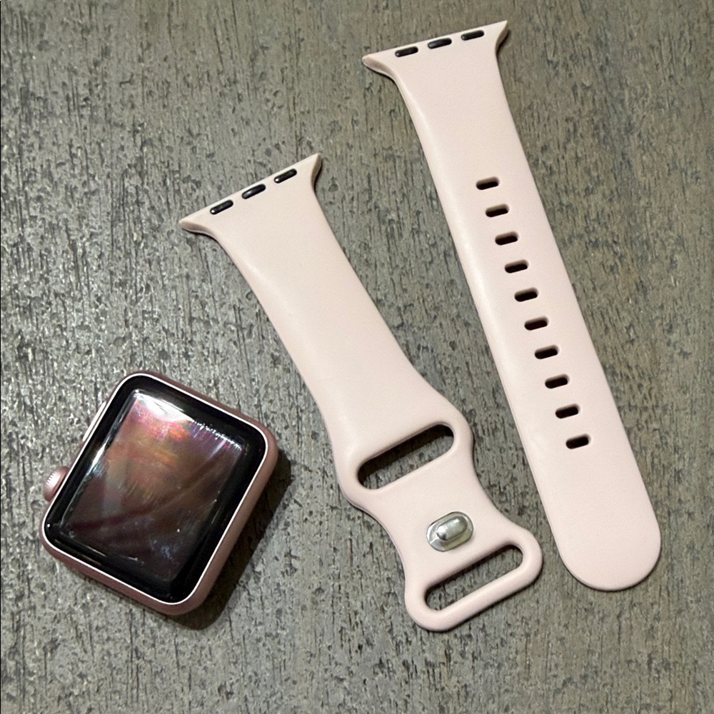Smartwatch with Pink Strap.  Older style.